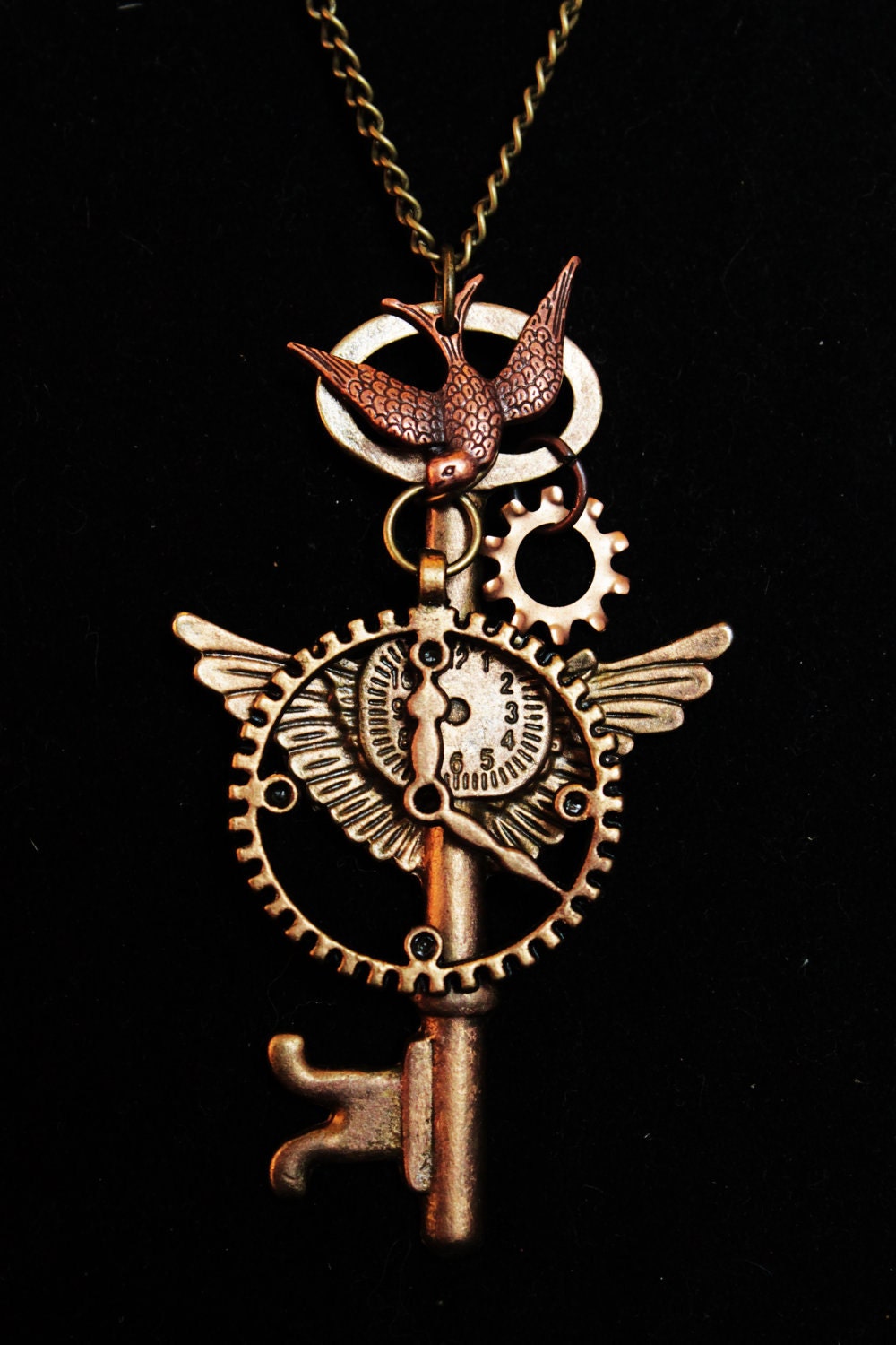 Steampunk Victorian Necklace Featuring Flying Key, gears, Sparrow or Kraken Octopus and large clock cog charms