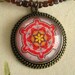 Spanish Tile Design Medallion in Red, Yellow & Pink on a Dark Plum Colored Beaded Necklace