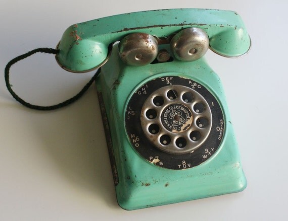 Vintage N.N. Hill Brass Co. Tin Toy Rotary Telephone
