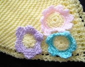 Flowered knitted baby blanket