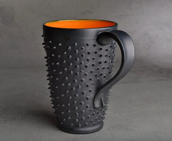 Spiky Mug: Made To Order One Black and Orange Dangerously Spiky Travel Mug by Symmetrical Pottery