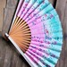 Vintage 40's Hand Painted Japanese paper fan with Island scene in Pink and Turquoise