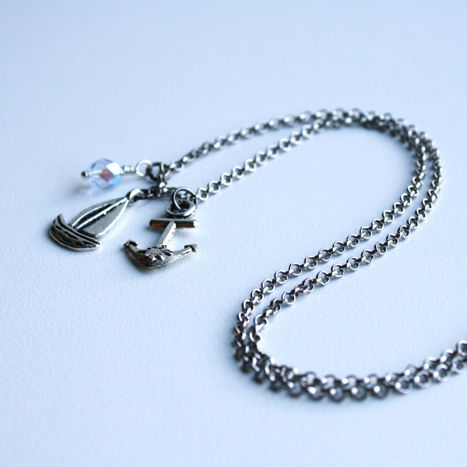 Nautical Necklace with Boat and Anchor Charms on by twirlybirdie