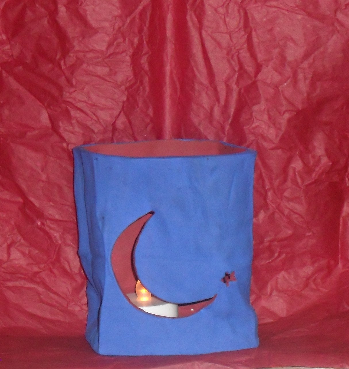 Blue and Red Ceramic Luminary Bag. Moon and Star Design. Holiday luminary fun themed