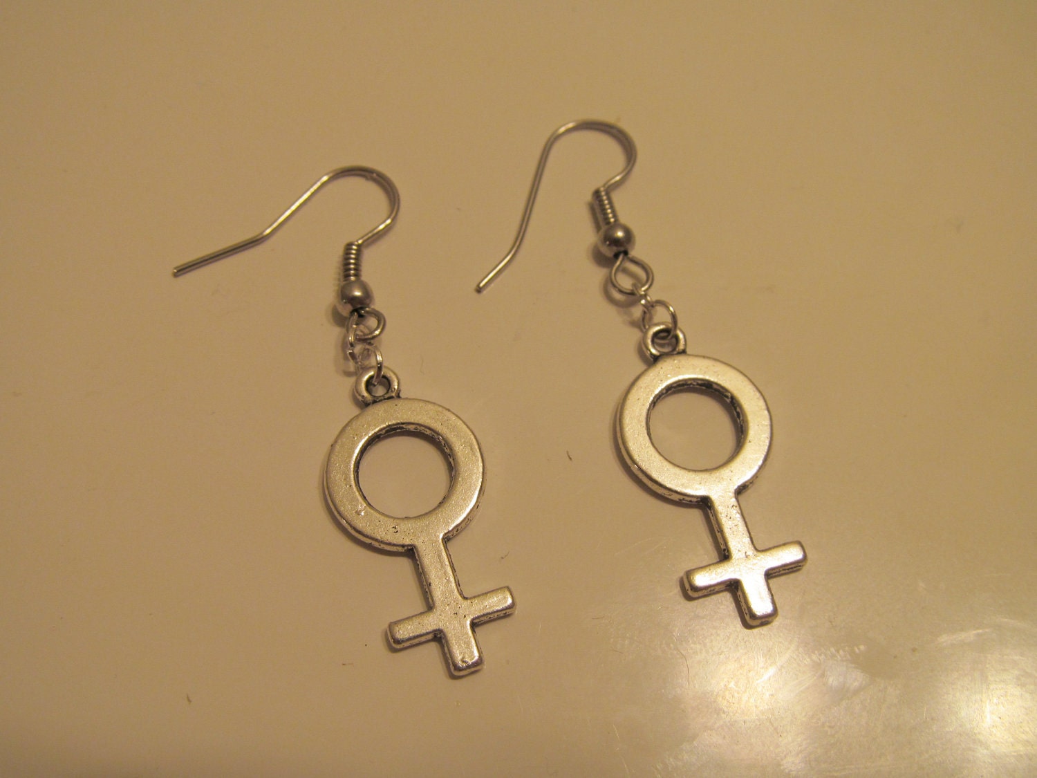 Handmade girl power dangling earrings