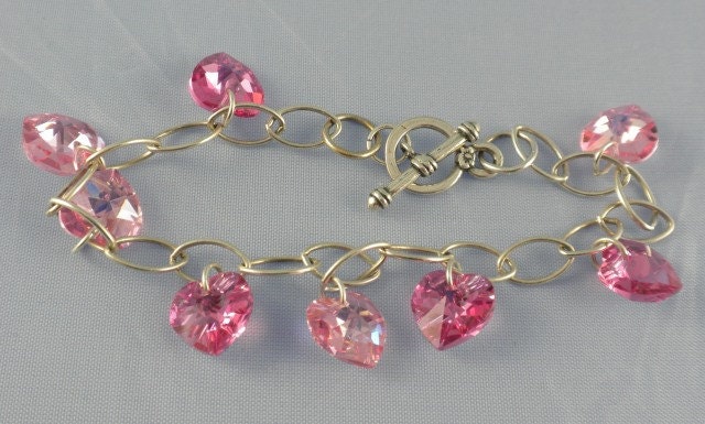 Pink Swarovski crystal heart sterling silver charm bracelet