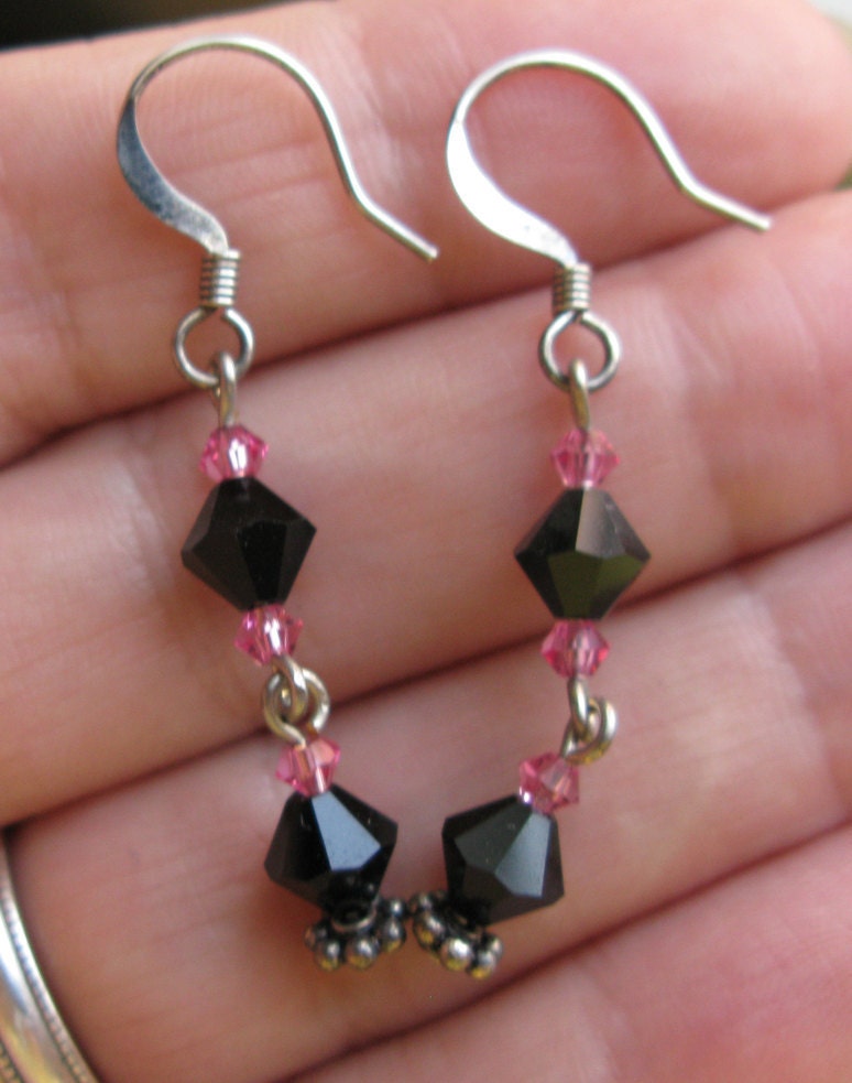 Bicone curious: Pink and black dangly bicone Austrian crystal earrings.
