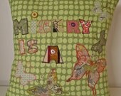 Cushion- 18" green, pink and multi coloured- Misery is a Butterfly