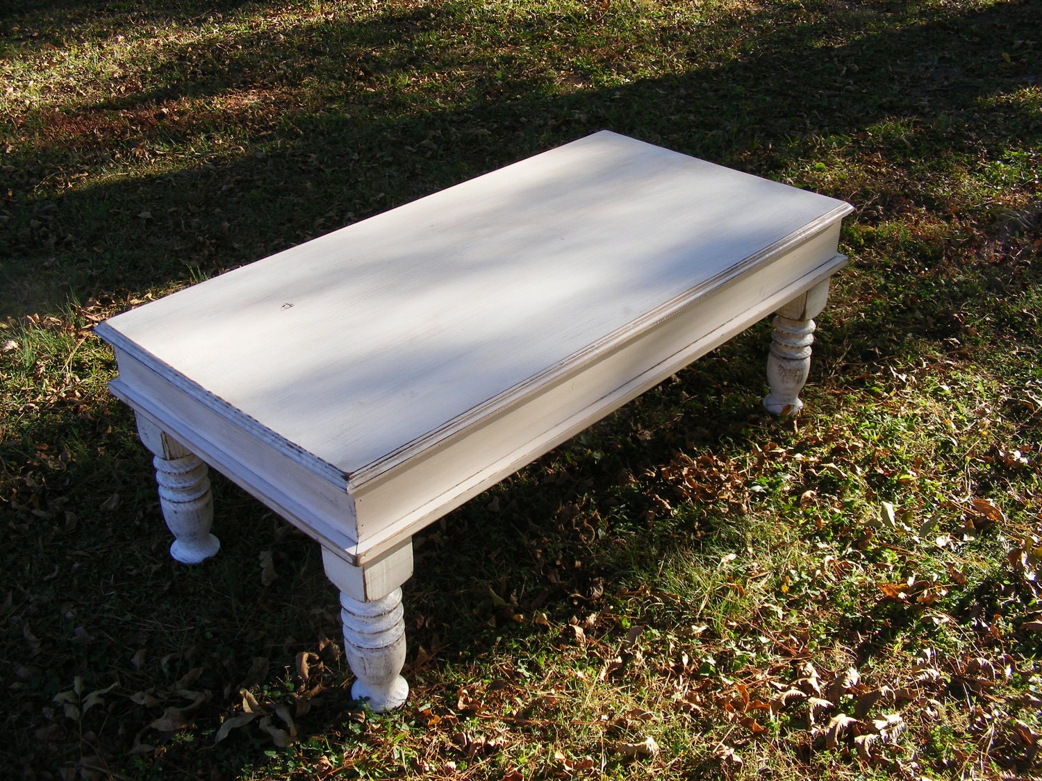 Shabby White Coffee Table with Beautiful Hand Carved Legs and a hinged top that opens