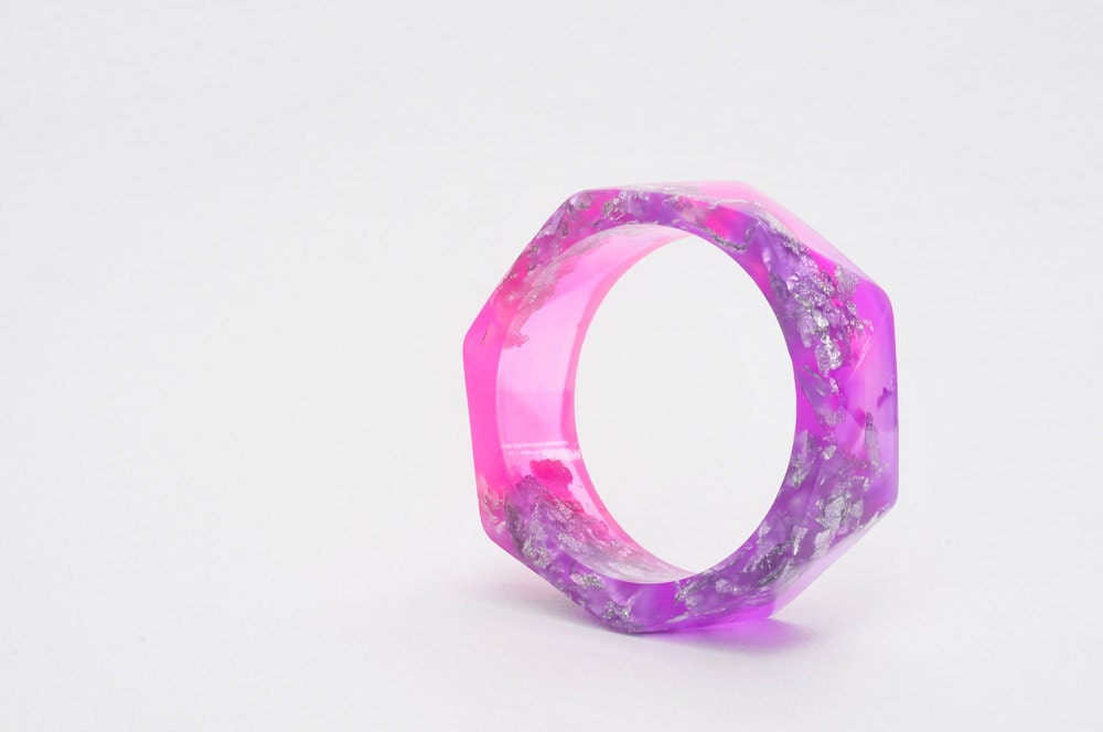 Pink and Purple resin bangle made with eco resin containing silver flakes with large triangle facets