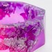 Pink and Purple resin bangle made with eco resin containing silver flakes with large triangle facets