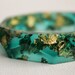 Emerald green with gold flakes eco resin faceted bracelet bangle