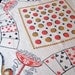 Gamers delight. Vtg 35-inch tablecloth with four napkins, great condition.