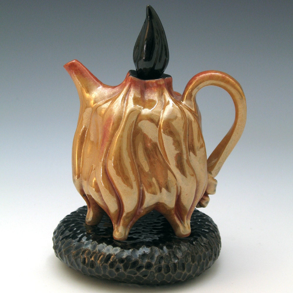 Luster flaming shino teapot with black pillow