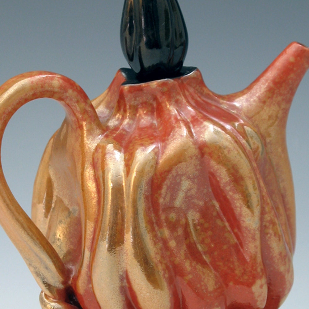 Luster flaming shino teapot with black pillow
