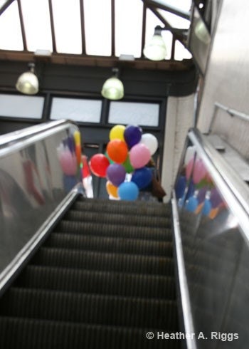 Balloons on an Escalator