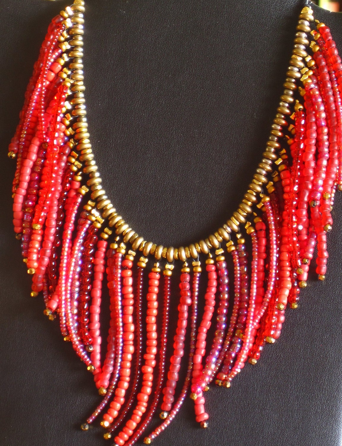 Southwestern style fringed beaded necklace in shades of red