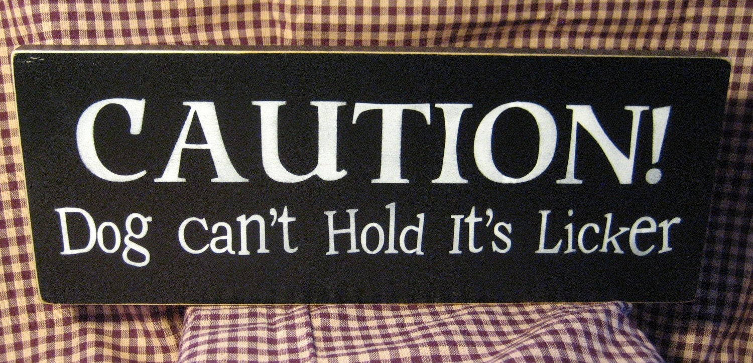 Caution dog can't hold it's licker,  black, primitive sign, pets,