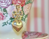 Vintage Sterling puffy heart and bow romantic necklace