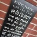 10" x 23" Wooden Sign - In this home...... we do.....