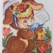 Vintage 1940s  Adorable  Easter bunny with Easter bonnet and parasol with basket of chicks on   Easter  Greeting  Card
