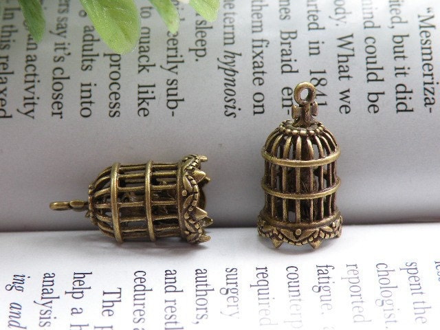 2pcs 0.8x0.4 inches antique brass one bird in birdcage bird cage charm pendant jewelry accessories PB105