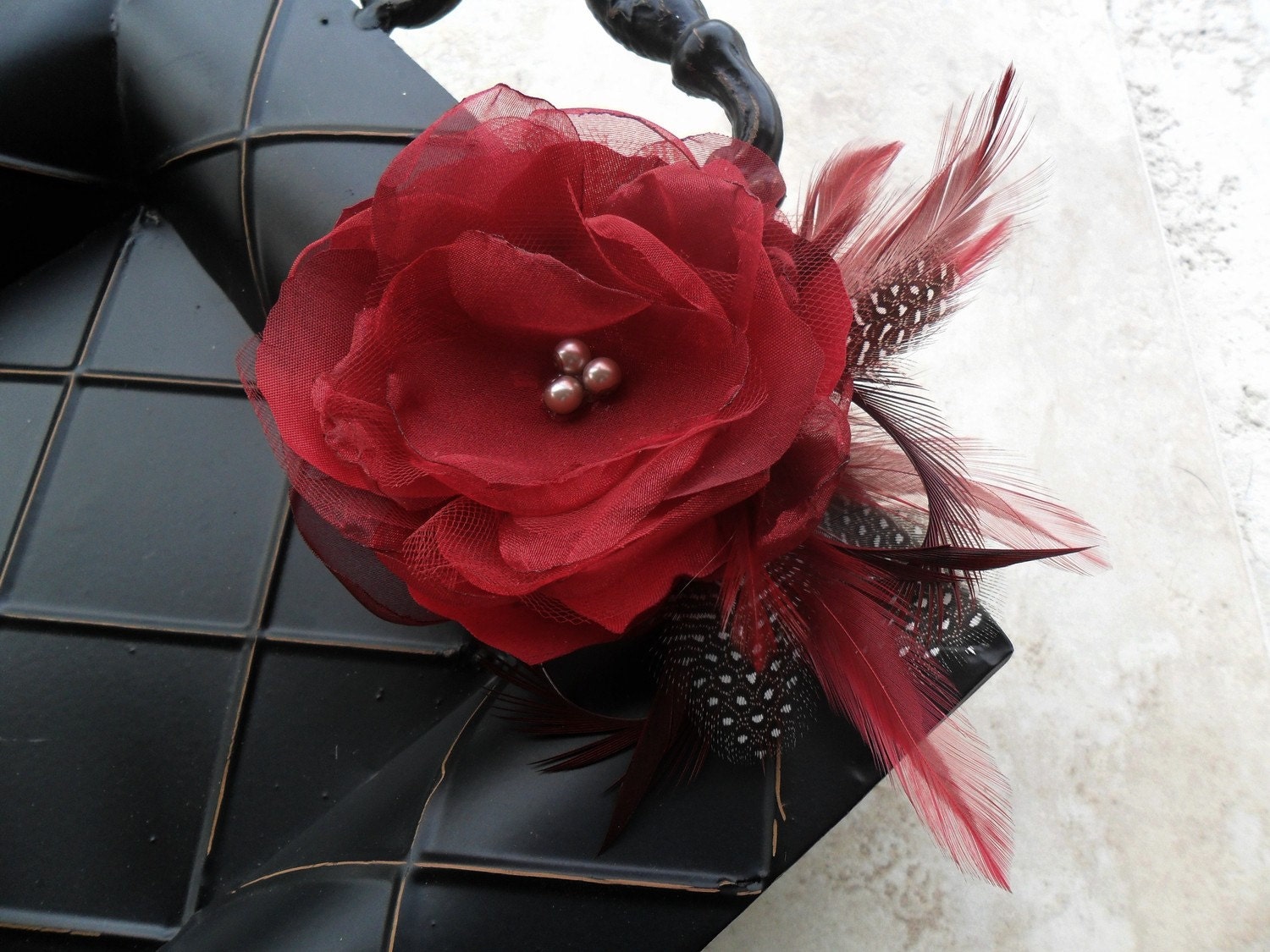 LeBarbara - red organza and fabric flower with feathers and pearls