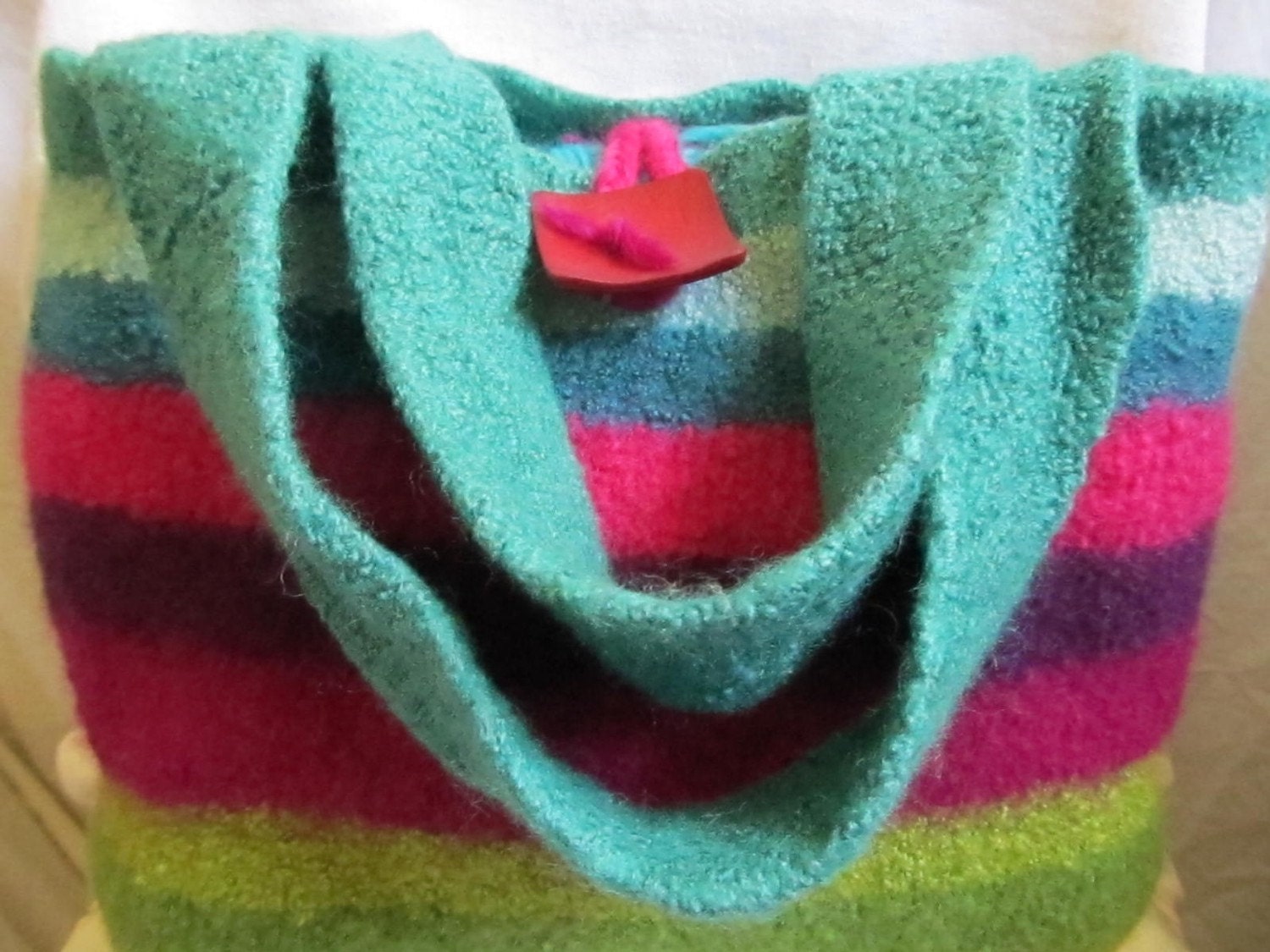 Felted Bag: Arboretum. Teal blues, fuchsia and leaf greens blend beautifully in this medium felted gypsy bag