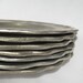 Set of Seven Pewter Plates