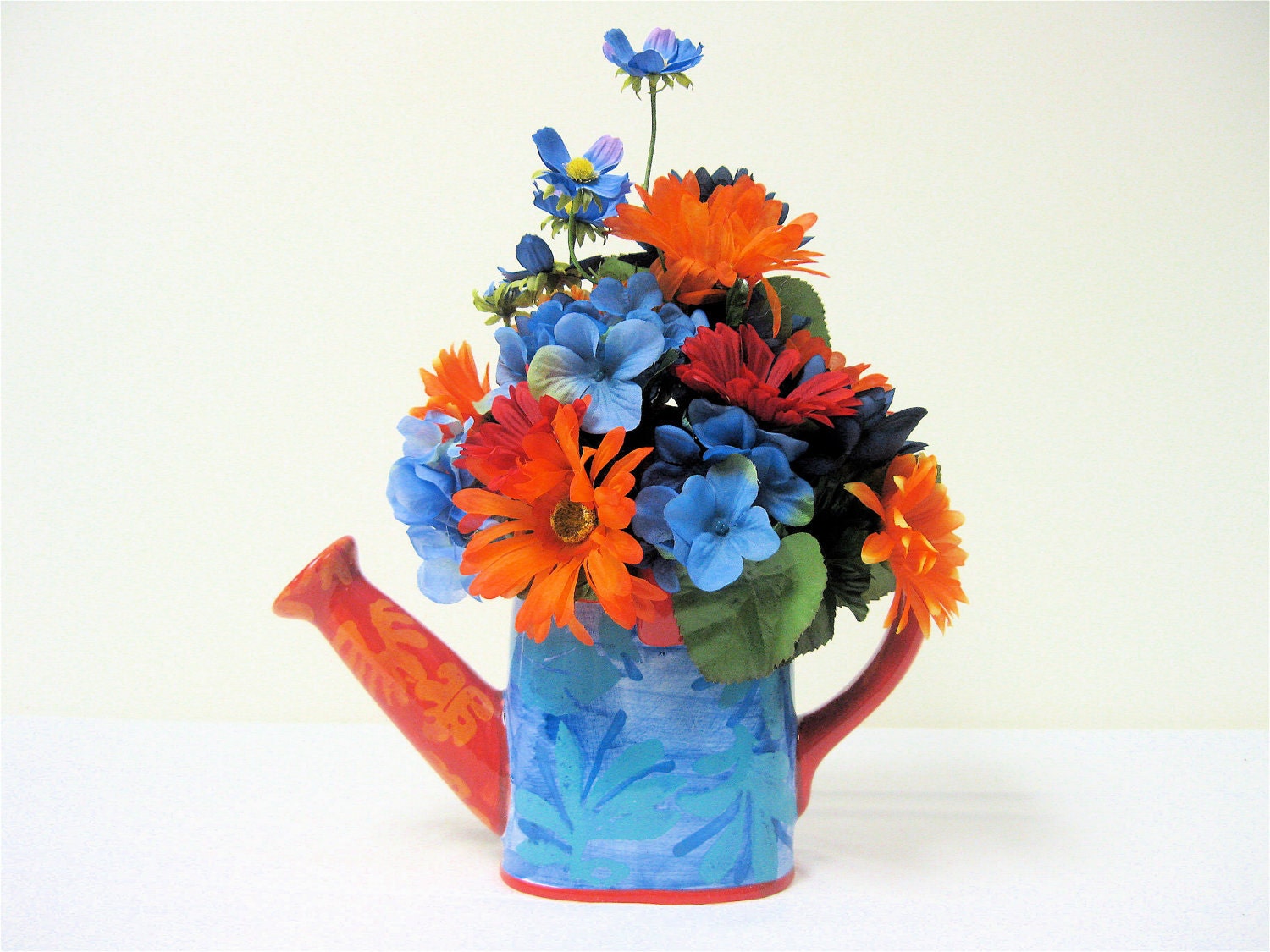 Spring Silk Floral ArrangementBlue Hydrangea, Orange Gerber Daisy (Approx. 12" H X 8)
