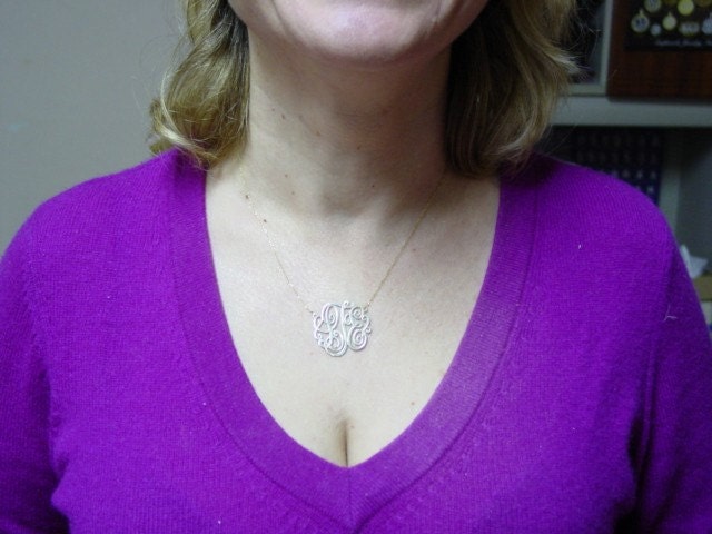 1 1/8" diameter,14k yellow gold monogram on 16" anchor cable chain .
