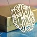 sterling silver monogram 2" diameter with a silver chain