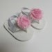 Infant flip flops with interchangable snap flower
