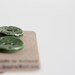 handmade ceramic buttons. dotted, medium, round, bottle green. unique handcrafted needlecraft supplies. set of 2.