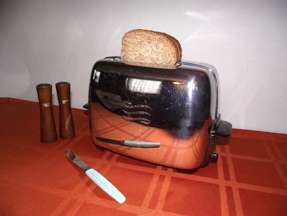Items similar to Vintage Toaster GE 3 Swirl 1950's Chrome & Bakelite
