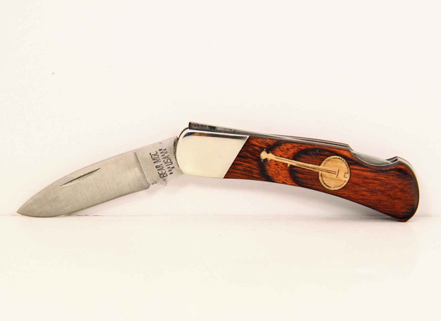 Bear & Son Executive Lockback with custom Cherry wood Banjo inlay.