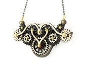 Wood Steampunk - Kinetic Wing Gear Pendent - Black and White