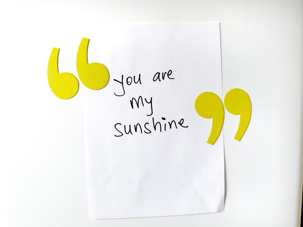 quote / unquote magnets - voluptuous & rounded quotation punctuation marks - bright yellow fabric