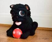 Playful pug puppy amigurumi