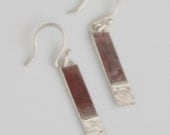 Textured silver dangle earrings