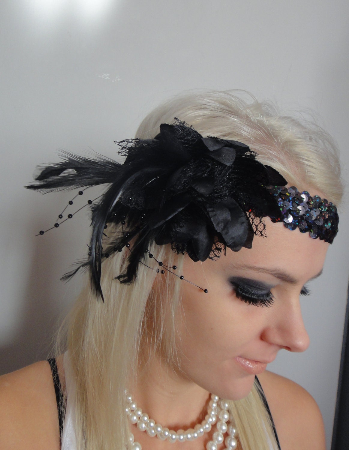 1920s black feather flapper headband races