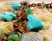 Handcrafted Turquoise copper charm bracelet,wirewrapped ocean scallop shells and bird, toggle clasp