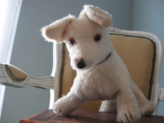 small white stuffed dog