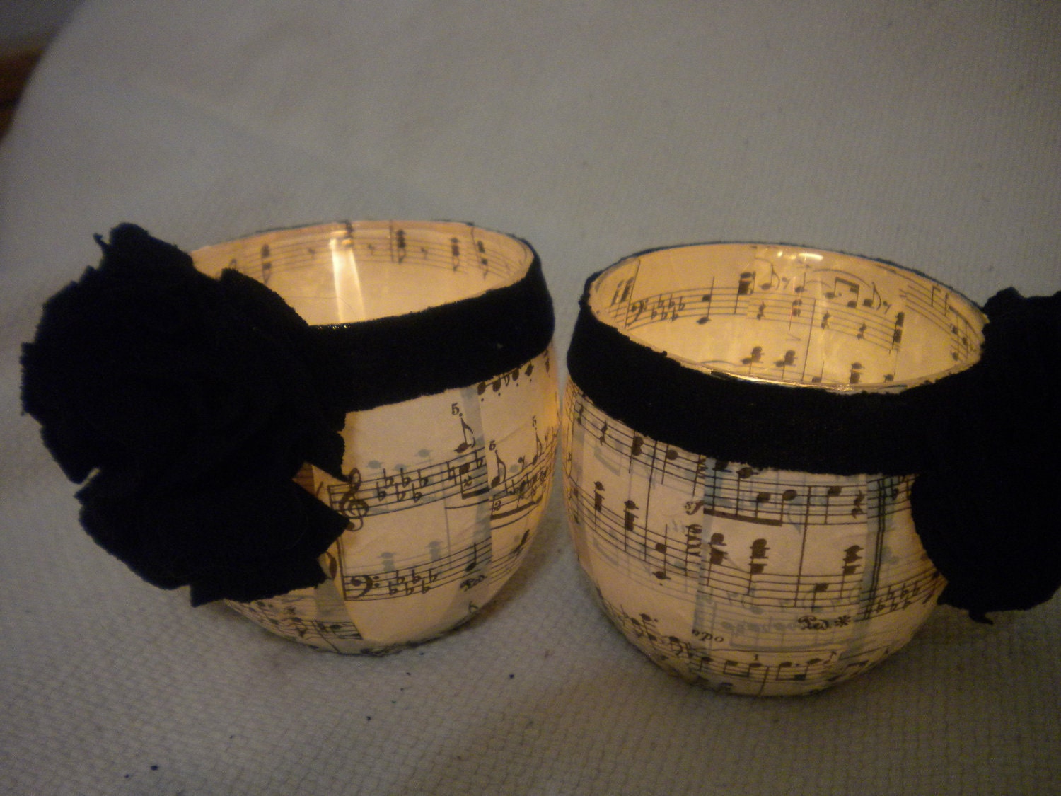 Set of 2 decoupaged sheet music candle holders