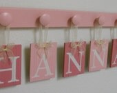 Baby Name Wall Hanging Sign Set Includes 6 Wooden Pegs Painted Pinks and Light Pink.  Custom Hanging Letters - HANNAH