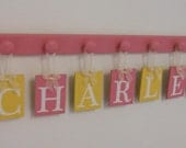 Pink Yellow Baby Name Wall Hanging Sign Set Includes 7 Wooden Peg Hangers Painted Pink and Yellow Personalized Letters for CHARLEY