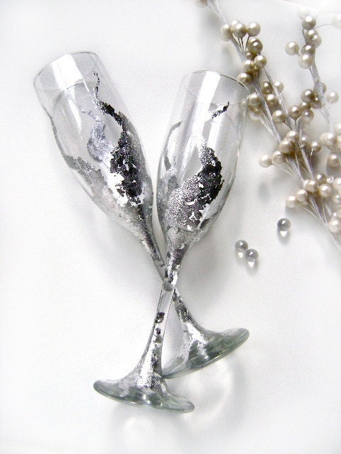Wedding champagne glasses, hand decorated with silver metal leaves