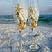 Starfish wedding champagne glasses, decorated with real starfish, sea shells, sea glass and pearls