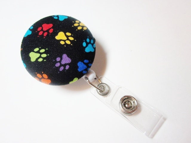 Badge Reel Covered Button in Paw Prints