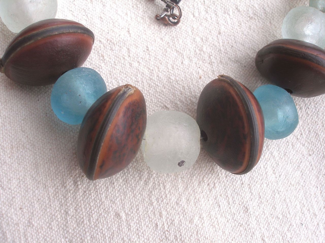 African Blue and  white clear recycled glass Mucuna seed  wood necklace by Fianaturals
